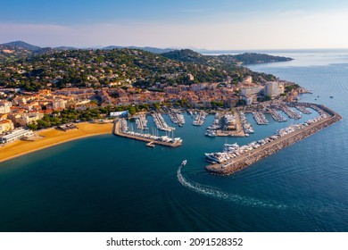 Picturesque view from drone of Sainte-Maxime townscape on Mediterranean coast with port for pleasure yachts on sunny autumn day, France - Shutterstock ID 2091528352