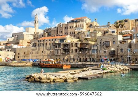 A picturesque view to Jaffa old city and an ancient harbor on a beautiful day. Tel Aviv, Israel. 