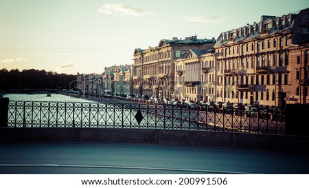 Picturesque view on Fontanka river (part of Neva river) in Saint Petersburg in summer during white nights. Toned picture.