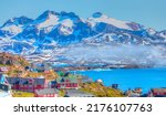 Picturesque village on coast of Greenland - Colorful houses in Tasiilaq, East Greenland