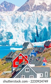 Picturesque village on coast of Greenland - Colorful houses in Tasiilaq, East Greenland - Shutterstock ID 2233924749