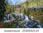 Picturesque waterfalls in the beautiful autumn mountain nature in Hrebienok in the High Tatras, Slovakia