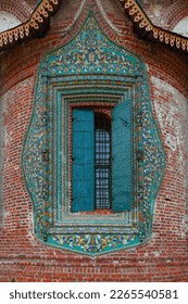 A picturesque window with a ceramic pattern of the Temple of the Beheading of John the Baptist in Yaroslavl. Russia.