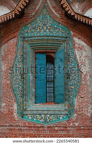A picturesque window with a ceramic pattern of the Temple of the Beheading of John the Baptist in Yaroslavl. Russia.