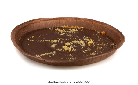 Pie  Crumbs On Brown Paper Plate Isolated On White