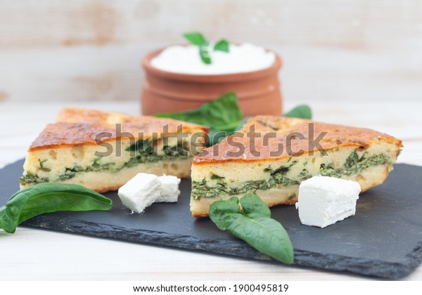 Pie with spinach and cheese. Greek Pie\
Spanakopita with Spinach and Feta\
Cheese.