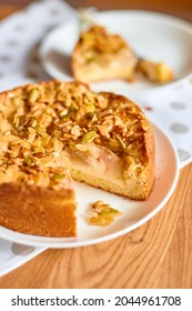 Piece Of Apple Or Pear Pie, Tart With Caramel Nuts On Wooden Table, Copy Space, Top View.