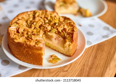 Piece Of Apple Or Pear Pie, Tart With Caramel Nuts On Wooden Table, Copy Space, Top View.