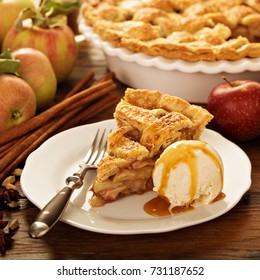 Piece Of An Apple Pie With Ice Cream Scoop And Caramel Sauce On A Plate, Fall Baking Concept