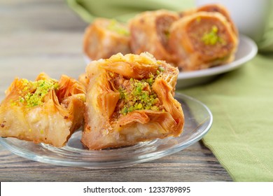 A Piece Of Baklawa On A  Plate On A  Table, Top View, Baklava, Feast Treat Ramadan Traditional Dessert