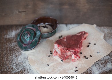 a piece of beef on the bone for soup or grill , selective focus