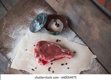 a piece of beef on the bone for soup or grill , selective focus