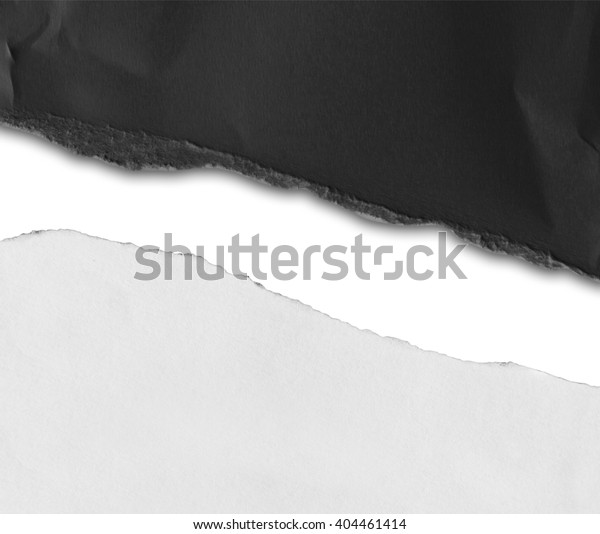 Piece\
of black and white torn paper on white\
background