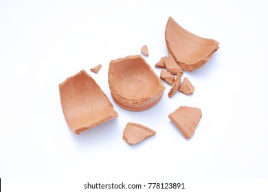 Piece of broken clay pots on white background.