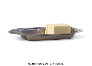 Piece Of Butter In Metal Butter Dish Isolated On White