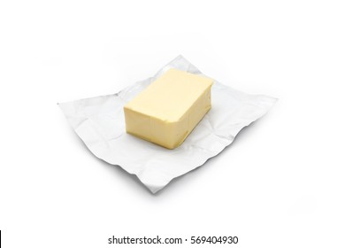 Piece of butter on a white background