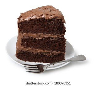 Piece Of Cake On Small Dessert Plate With Fork, White Background