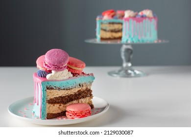 Piece Of Cake With Pink And Blue Decor On White Table