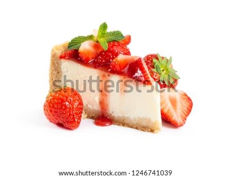 Piece of cheesecake with fresh strawberries and mint isolated on white background