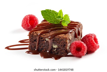 Piece Of Chocolate Cake Brownie With Raspberries Isolated On White Background