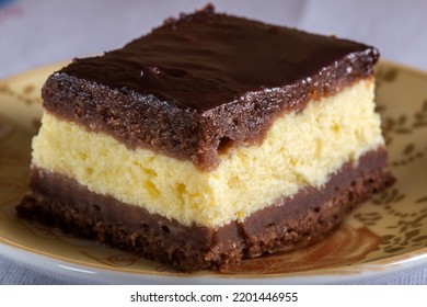 Piece Of Chocolate Cheesecake Brownie On Plate