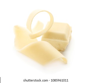 Piece Of Chocolate And Curl On White Background