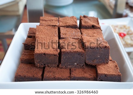 Piece of chocolate royce on bowl. - (Close up)