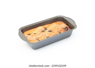 Piece Of Craft Cornbread Home Made Johnny Bread Made Of Corn Flour And Fig Pieces In A Metallic Bakery Mold Isolated On A White Background