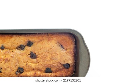 Piece Of Craft Cornbread Home Made Johnny Bread Made Of Corn Flour And Fig Pieces In A Metallic Bakery Mold Isolated On A White Background