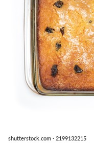 Piece Of Craft Cornbread Home Made Johnny Bread Made Of Corn Flour And Fig Pieces In A Glass Refractory For Baking From Above Isolated On A White Background