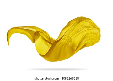 Piece of flying golden cloth isolated on white background. High resolution image