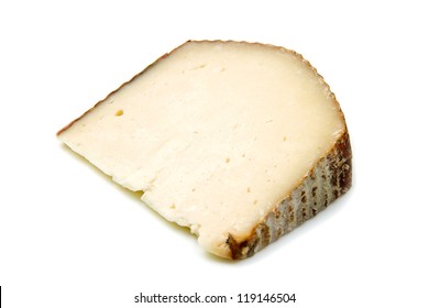 A Piece Of Goat Cheese Isolated On White