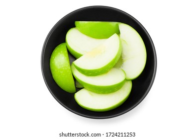 piece of green apple in black bowl isolated on white background - Powered by Shutterstock