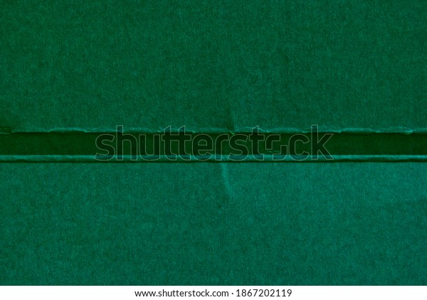 A piece of green paper folded in two parts for
your design, lettering
concept