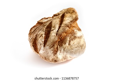A piece of handmade freshly baked rye bread, isolated on white background.