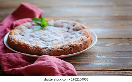 Piece Of Homemade Simple Pie With Fresh Red Raspberries And Black Mulberry On A Dark Wooden Rustic Background. Summer Berry Dessert. Sugar Powder.