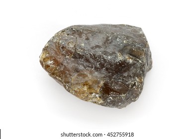 Piece of Indian frankincense, Salai or shallaki (Boswellia serrata) isolated on white background. Macro close up. Top view.