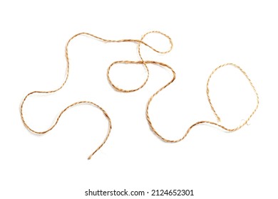 Piece of jute twine isolated on white background. Natural rope for packaging and decoration. Coarse linen threads. Hemp twine. - Shutterstock ID 2124652301