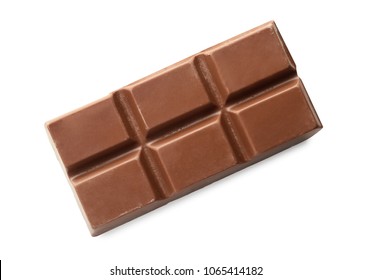 Piece of milk chocolate on white background - Shutterstock ID 1065414182