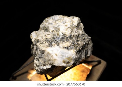 Piece Of Natural Multilayer Magnetite Ore On Black Background