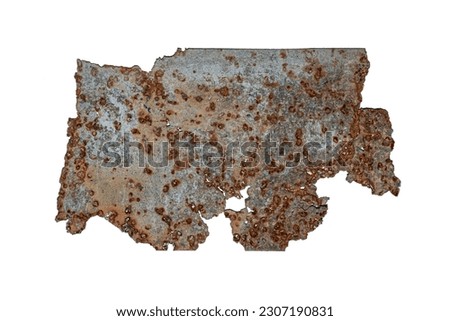A piece of old tin rusty metalic background, Iron oxide, ferric oxide, and tin iron is falling off.