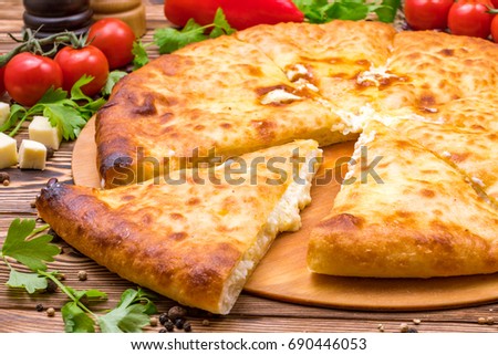 piece of Ossetian cheese pie on a wooden background  Stock photo © 