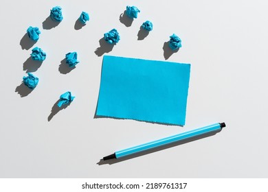 Piece Of Paper With Important Messages Surrounded By Paper Wraps And Pen  Crutial Announcement On Paperboard With Crumpled Notes Around  Recent Ideas Presented On Note 