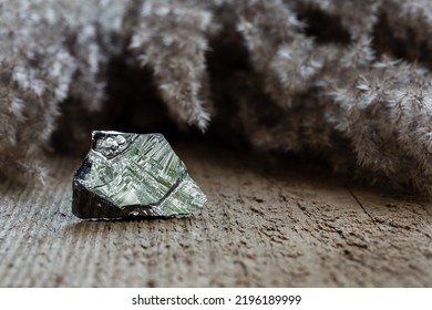 Piece Of Raw Polycrystalline Silicon, Polysilicon, Over Wooden Background