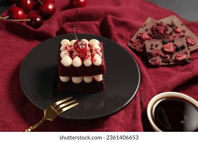 Piece of red velvet cake and fork on table, closeup - Powered by Shutterstock