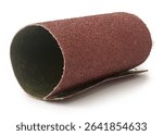 piece of reddish brown sandpaper rolled isolated white background, P40 coarse-grit abrasive commonly used for heavy sanding tasks