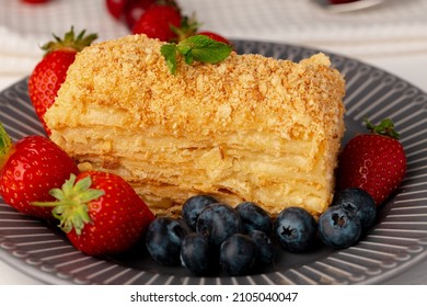 Piece Of Russian Honey Cake Medovik Served With Berries