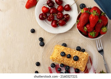 Piece Of Russian Honey Cake Medovik Served With Berries