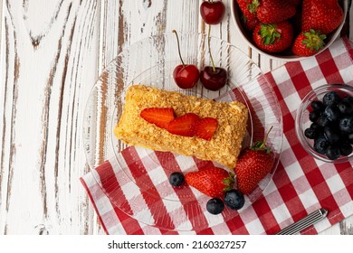 Piece Of Russian Honey Cake Medovik Served With Berries