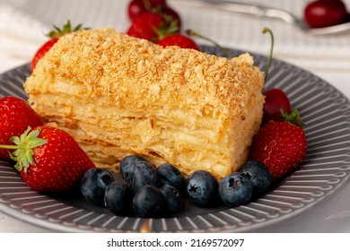 Piece Of Russian Honey Cake Medovik Served With Berries